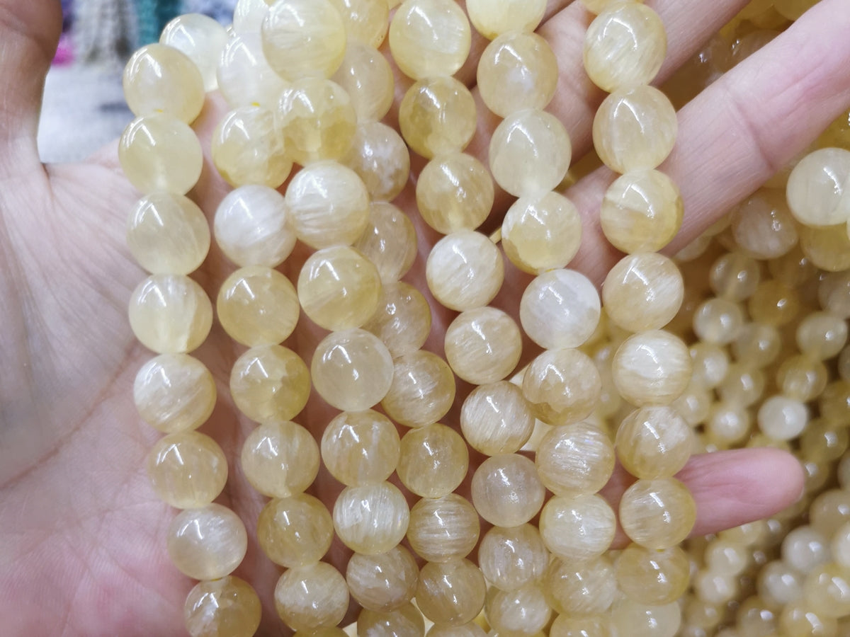 15.5" 8mm natural yellow honey calcite round beads