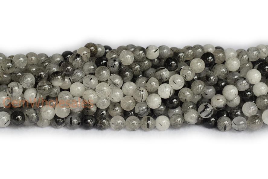 Rutilated Quartz - Round faceted- beads supplier