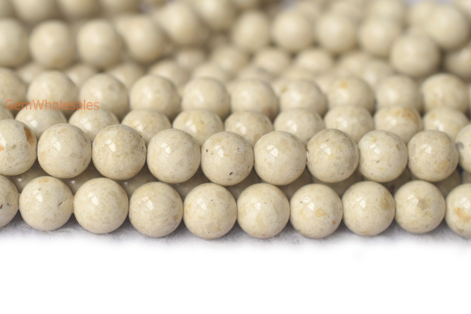 Fossil - Round- beads supplier