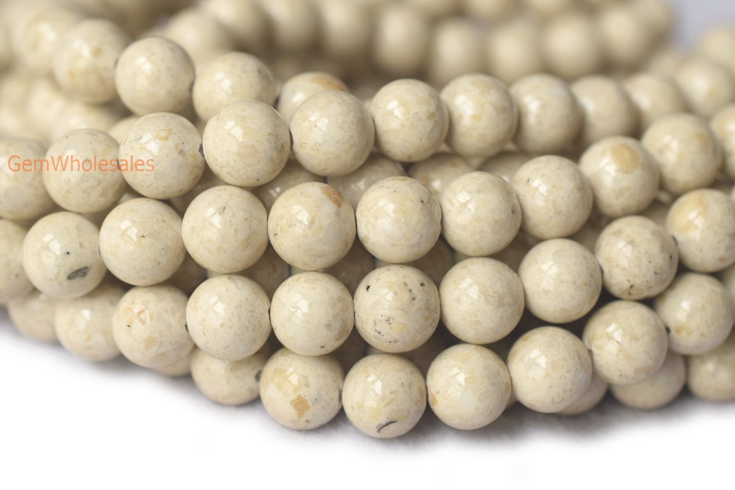 Fossil - Round- beads supplier