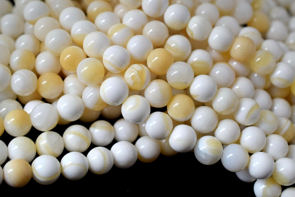 15.5" 10mm/12mm Natural half yellow shell round beads